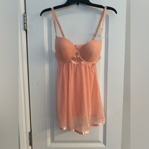 Very feminine pale peach nightgown lingerie piece size medium worn only 1 time.